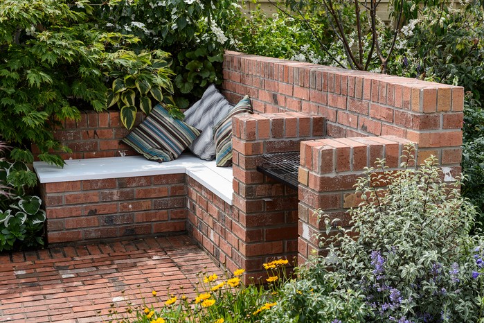 Brick seating and BBQ area. Jason Ingram